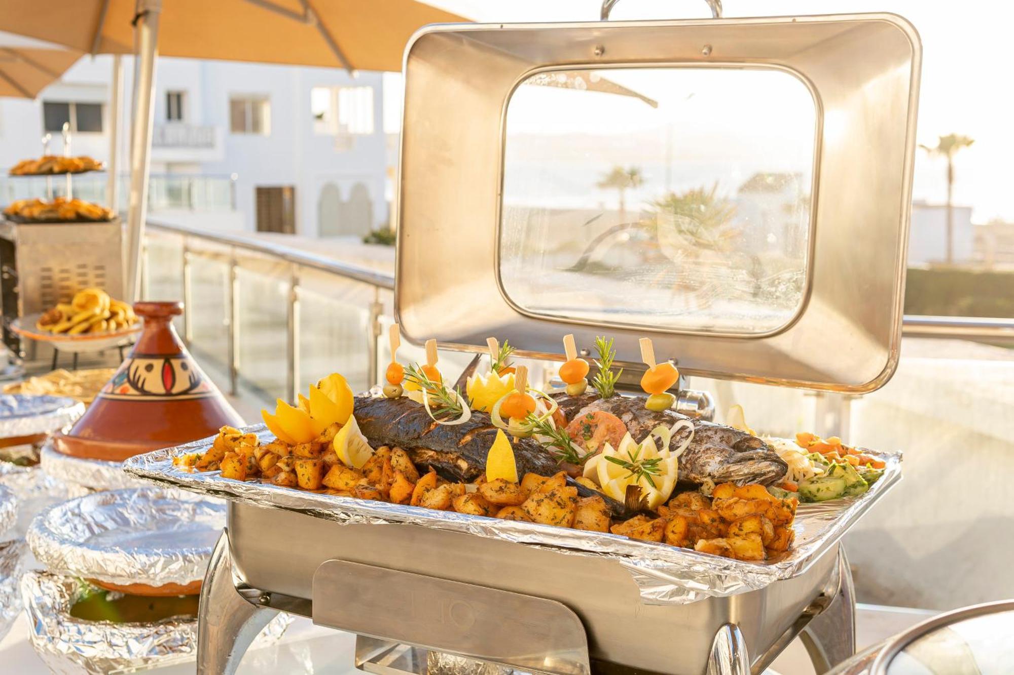 Grand Mogador Sea View & Spa Tangier Exterior photo A chafing dish