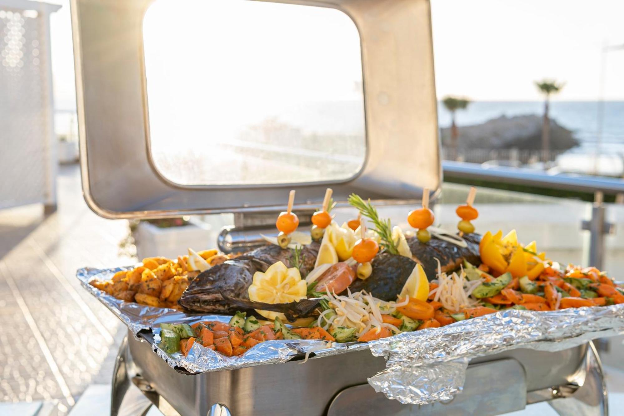 Grand Mogador Sea View & Spa Tangier Exterior photo A chafing dish