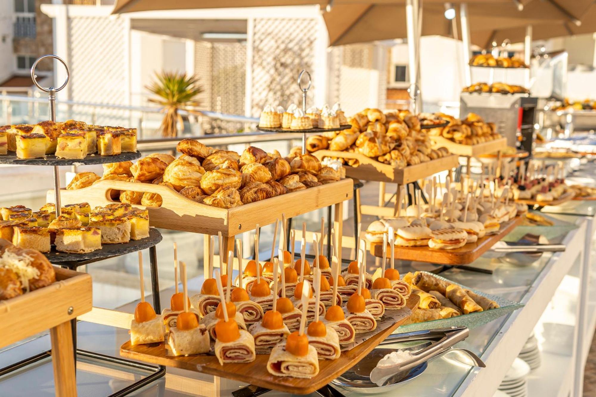 Grand Mogador Sea View & Spa Tangier Exterior photo A buffet at a hotel