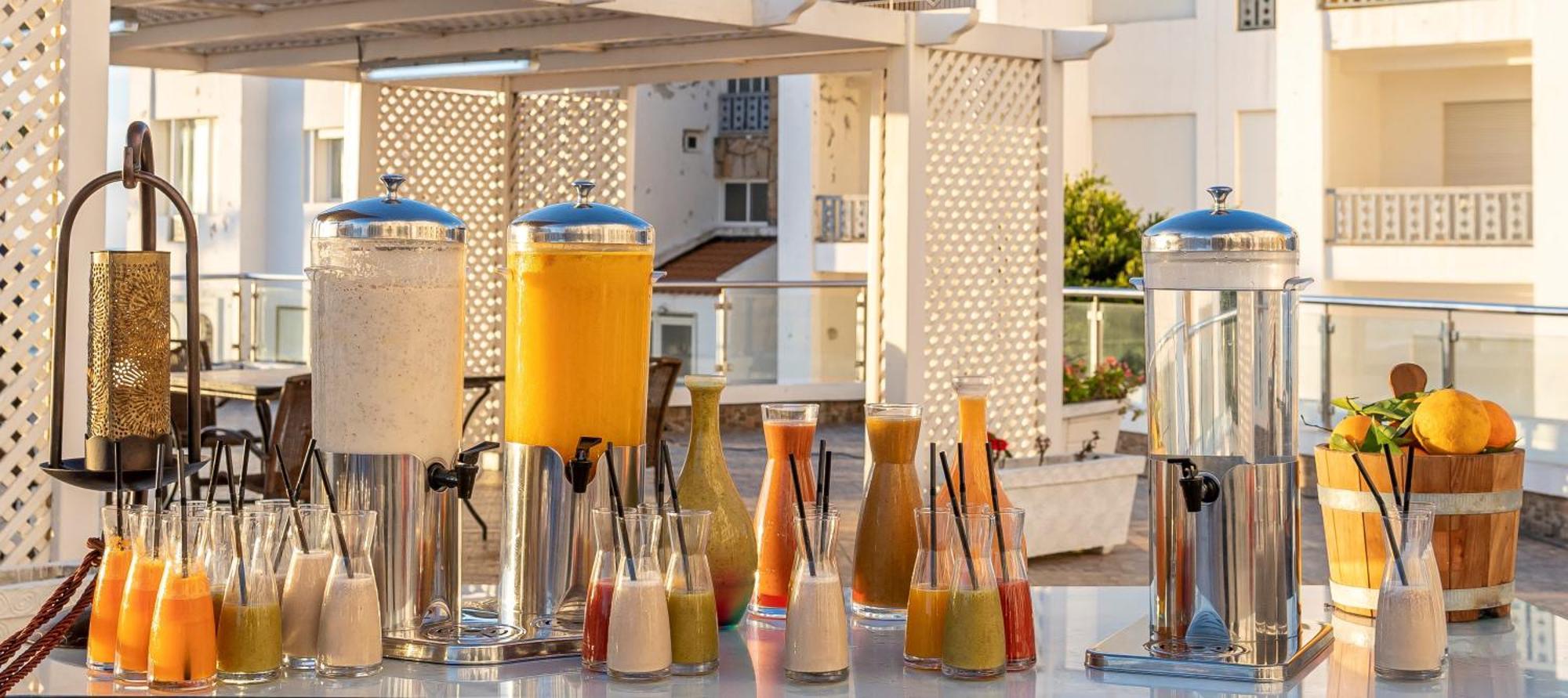 Grand Mogador Sea View & Spa Tangier Exterior photo A selection of fruit juices