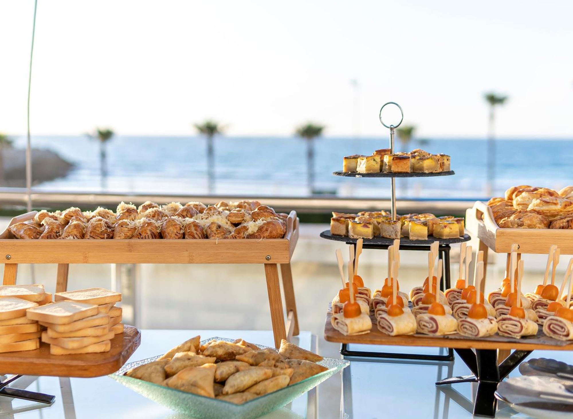 Grand Mogador Sea View & Spa Tangier Exterior photo A buffet
