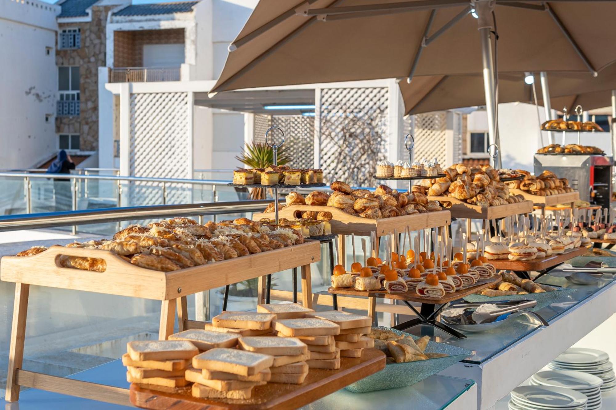 Grand Mogador Sea View & Spa Tangier Exterior photo A buffet at a hotel