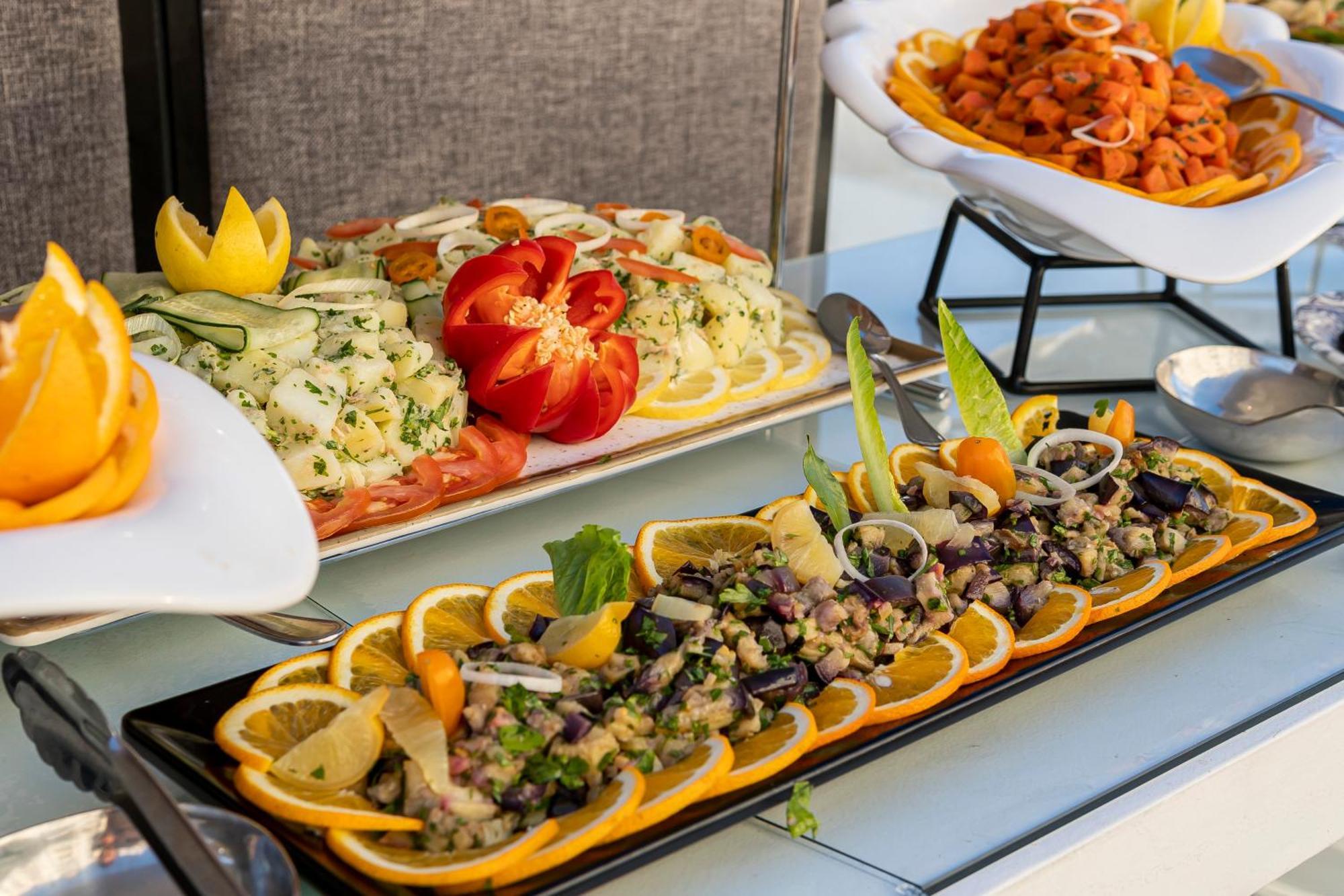 Grand Mogador Sea View & Spa Tangier Exterior photo A buffet at a hotel