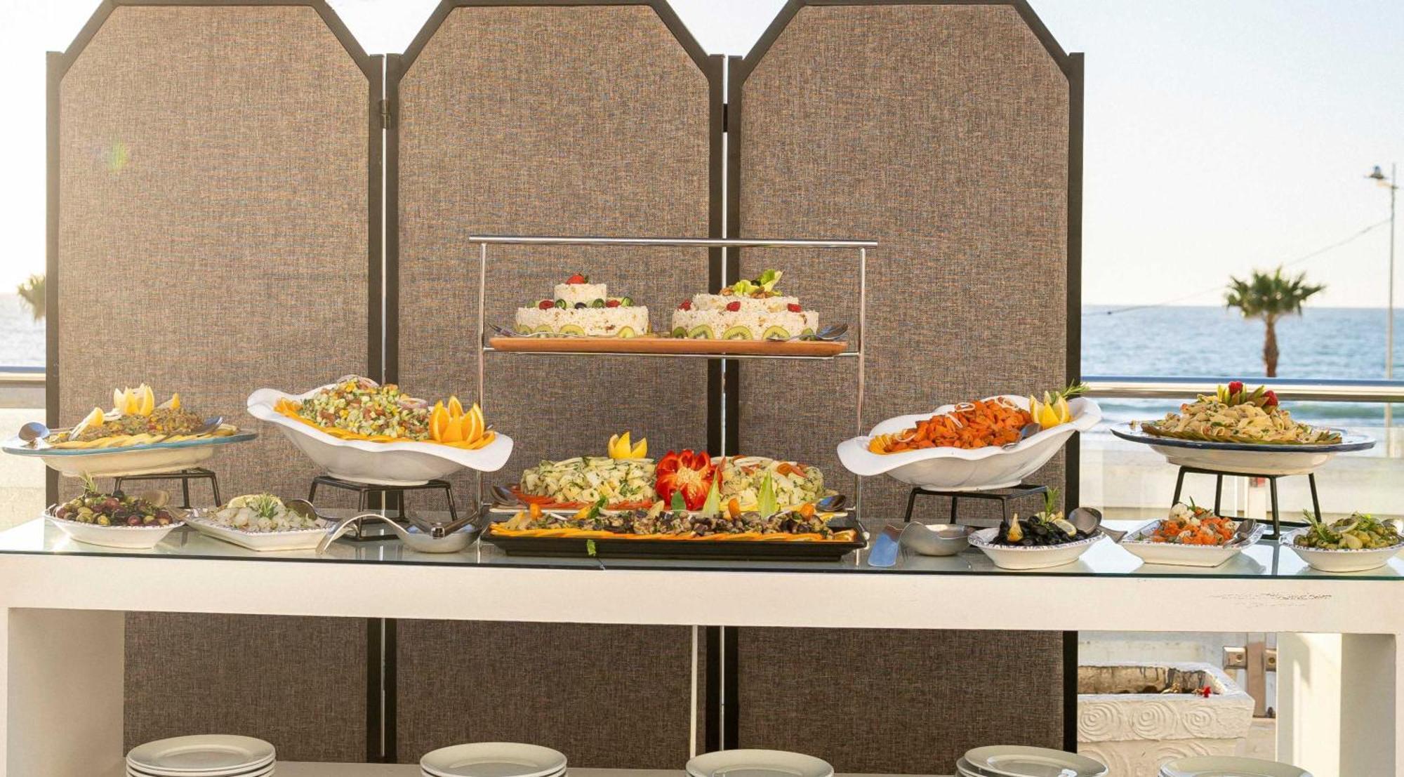 Grand Mogador Sea View & Spa Tangier Exterior photo A buffet on a cruise ship