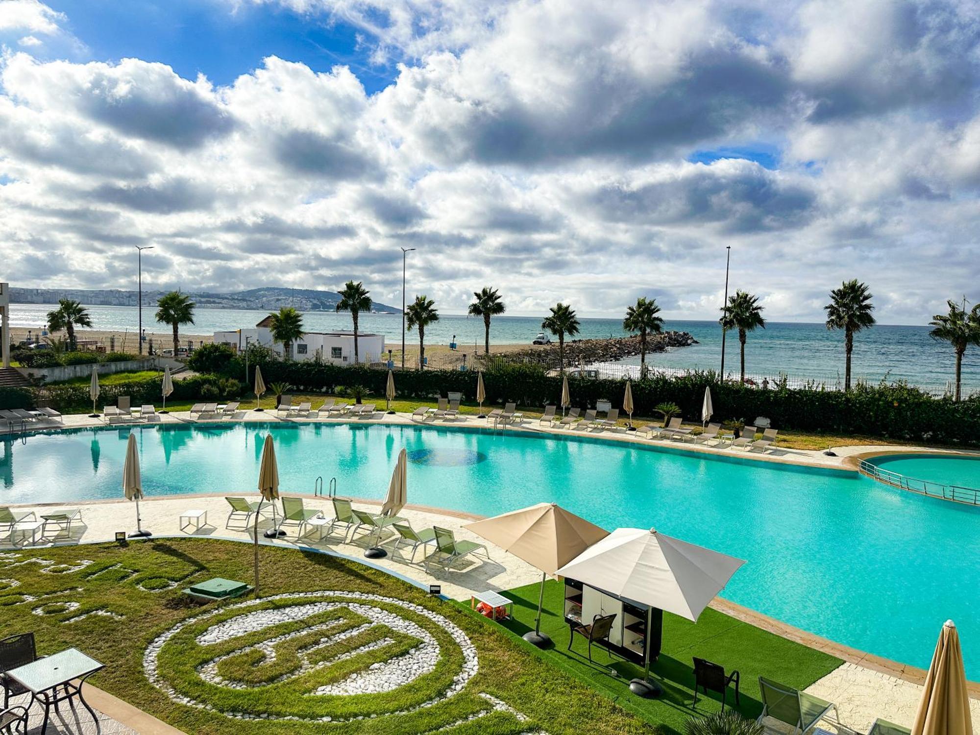 Grand Mogador Sea View & Spa Tangier Exterior photo View of the pool at the Hotel