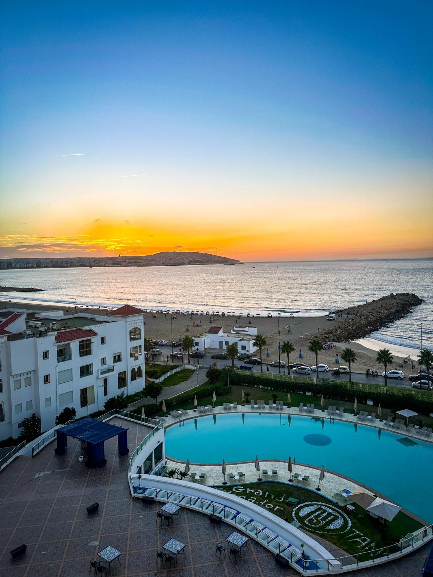 Grand Mogador Sea View & Spa Tangier Exterior photo Sunset at the beach of El Jadida