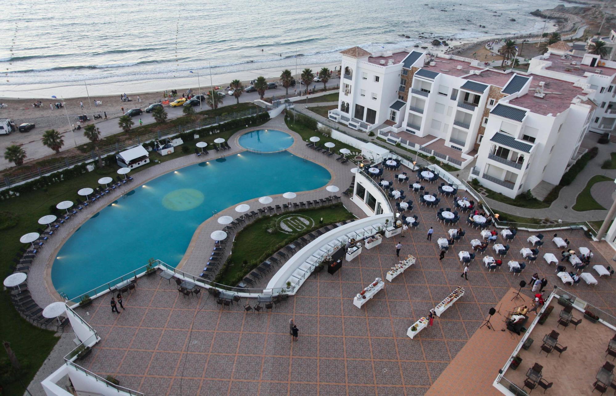 Grand Mogador Sea View & Spa Tangier Exterior photo Aerial view of the pool at the Sheraton Vistana Resort