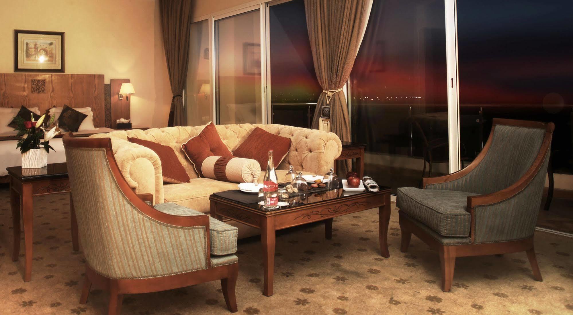 Grand Mogador Sea View & Spa Tangier Exterior photo A living room in a suite at the Burj Al Arab